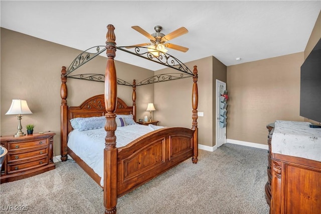 7029 Bocaire Dr, Las Vegas, NV 89131 - bedroom with light colored carpet, baseboards, and a ceiling fan