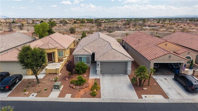 7029 Bocaire Dr, Las Vegas, NV 89131 - view of front of house featuring concrete driveway, a tiled roof, a garage, stucco siding, and a residential view