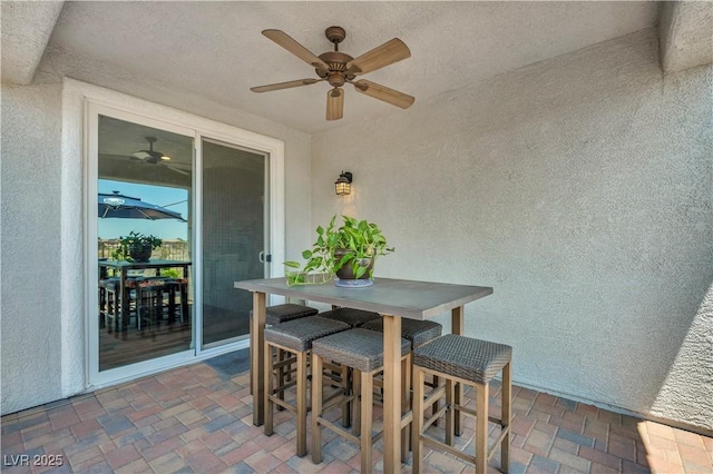 7029 Bocaire Dr, Las Vegas, NV 89131 - view of patio with a ceiling fan and outdoor dining space