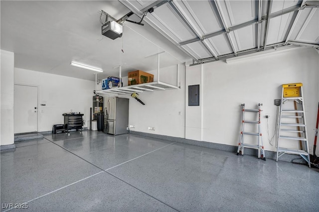 7029 Bocaire Dr, Las Vegas, NV 89131 - garage with a garage door opener, stainless steel refrigerator with ice dispenser, electric panel, and baseboards