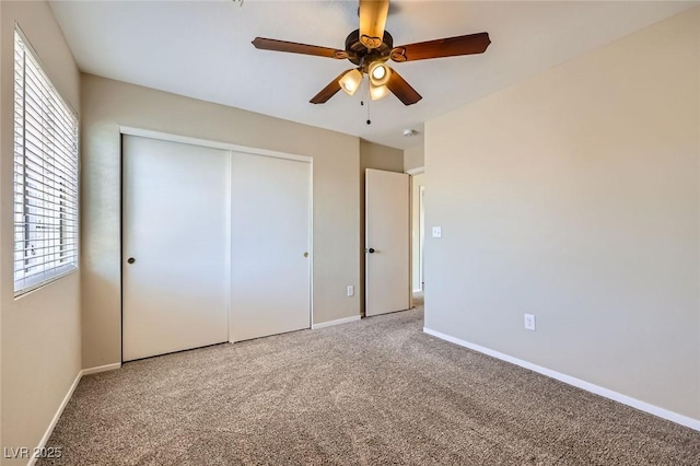 7382 Elbridge Way, Las Vegas, NV 89113 - unfurnished bedroom with carpet, a closet, baseboards, and ceiling fan