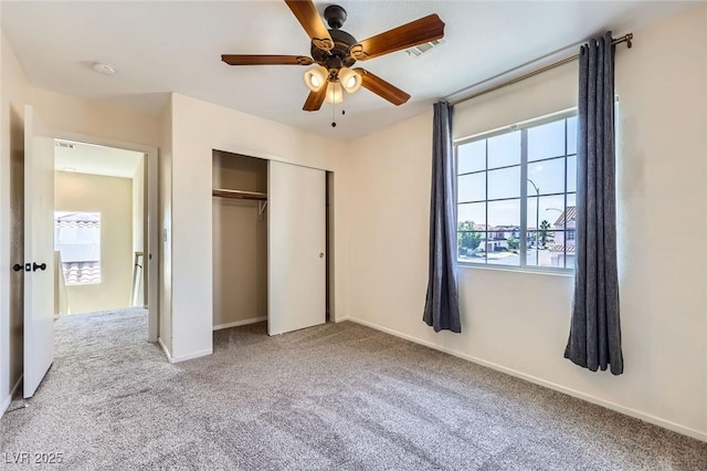 7382 Elbridge Way, Las Vegas, NV 89113 - unfurnished bedroom featuring carpet floors, a closet, baseboards, and a ceiling fan