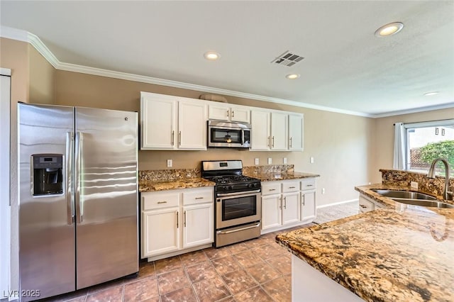 7382 Elbridge Way, Las Vegas, NV 89113 - kitchen with stainless steel appliances, a sink, white cabinetry, ornamental molding, and stone counters