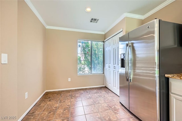 7382 Elbridge Way, Las Vegas, NV 89113 - kitchen with stainless steel fridge with ice dispenser, crown molding, baseboards, light tile patterned floors, and recessed lighting