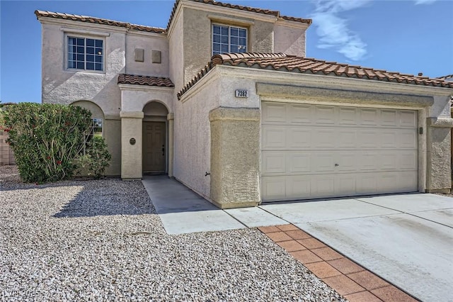 7382 Elbridge Way, Las Vegas, NV 89113 - mediterranean / spanish-style house with stucco siding, a tile roof, and concrete driveway