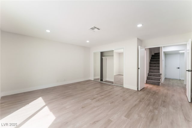 3409 El Cortez Ave, Las Vegas, NV 89102 - below grade area featuring stairway, light wood finished floors, recessed lighting, and baseboards