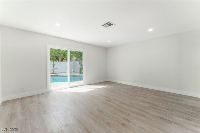 3409 El Cortez Ave, Las Vegas, NV 89102 - spare room featuring light wood-style floors, recessed lighting, and baseboards