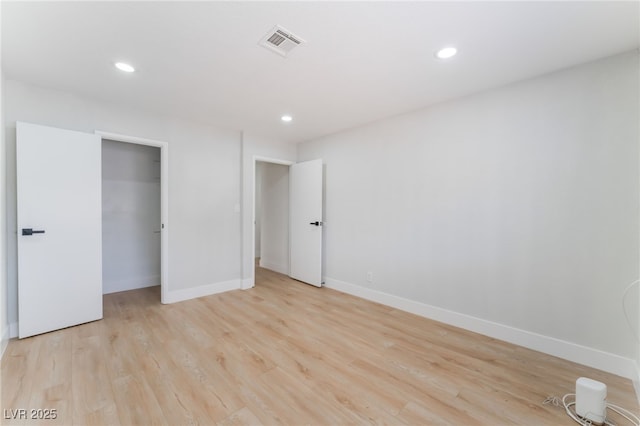 3409 El Cortez Ave, Las Vegas, NV 89102 - unfurnished bedroom featuring baseboards, recessed lighting, light wood finished floors, and a closet