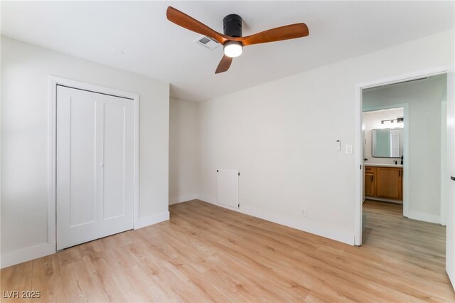 3409 El Cortez Ave, Las Vegas, NV 89102 - unfurnished bedroom with light wood-style flooring, a closet, and a ceiling fan