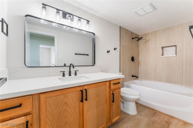 3409 El Cortez Ave, Las Vegas, NV 89102 - full bathroom with toilet, vanity, shower / tub combination, and wood finished floors