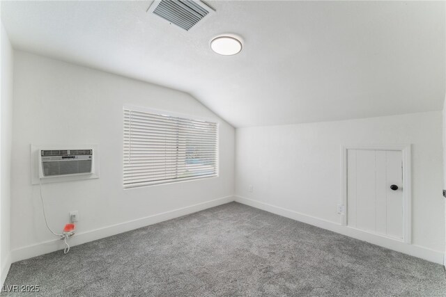 3409 El Cortez Ave, Las Vegas, NV 89102 - bonus room with vaulted ceiling, an AC wall unit, carpet flooring, and baseboards