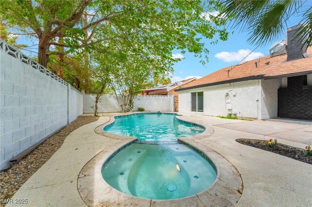 3409 El Cortez Ave, Las Vegas, NV 89102 - view of pool featuring a patio area, a fenced backyard, and a pool with connected hot tub
