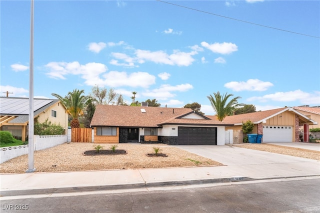 3409 El Cortez Ave, Las Vegas, NV 89102 - ranch-style home with a garage, driveway, and brick siding