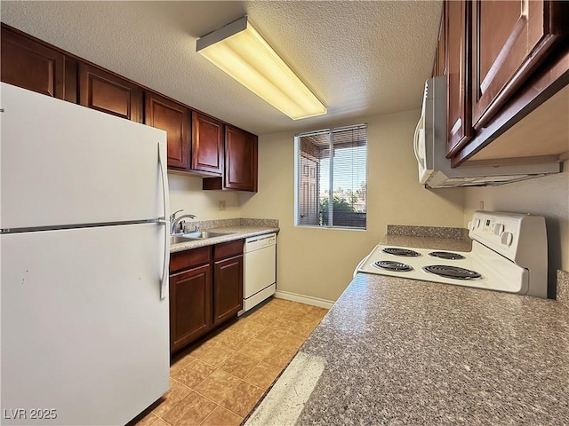 4943 Indian River Dr Unit 133, Las Vegas, NV 89103 - kitchen featuring white appliances, a sink, a textured ceiling, and baseboards