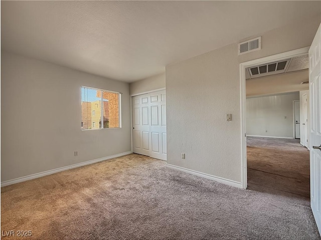 4943 Indian River Dr Unit 133, Las Vegas, NV 89103 - unfurnished bedroom with carpet, baseboards, and a closet