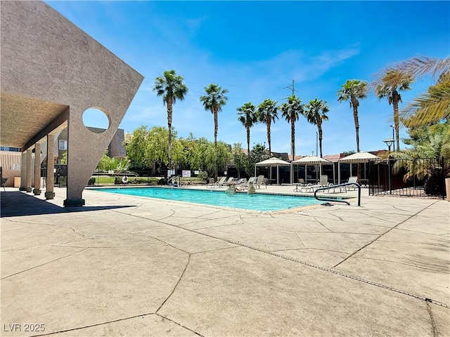 4943 Indian River Dr Unit 133, Las Vegas, NV 89103 - community pool with a patio