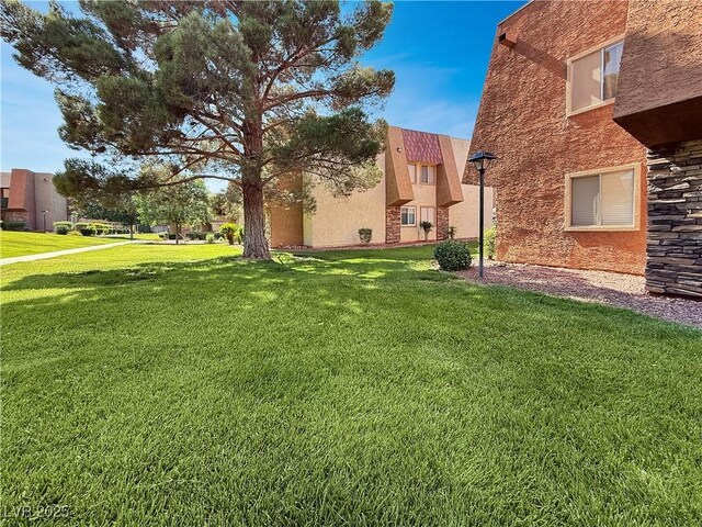 4943 Indian River Dr Unit 133, Las Vegas, NV 89103 - view of green lawn