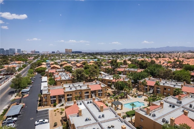 5166 S Jones Blvd Unit 205, Las Vegas, NV 89118 - bird's eye view of a pool area and a mountain backdrop