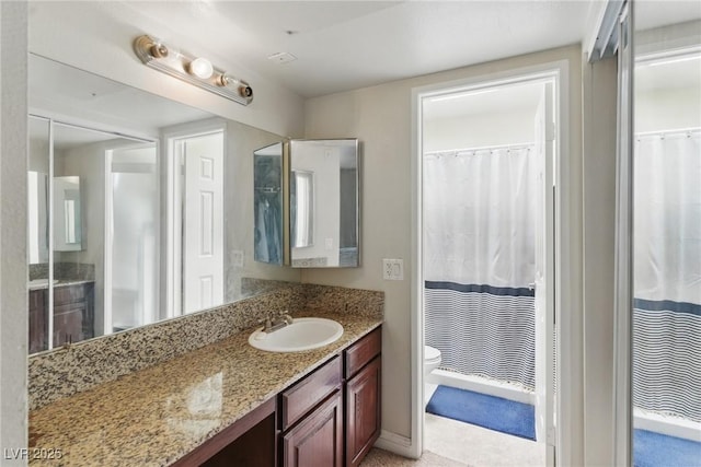 5166 S Jones Blvd Unit 205, Las Vegas, NV 89118 - bathroom featuring toilet, vanity, and a shower with shower curtain