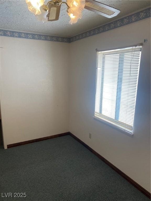631 Mccannon St, Pioche, NV 89043 - empty room with dark colored carpet and baseboards