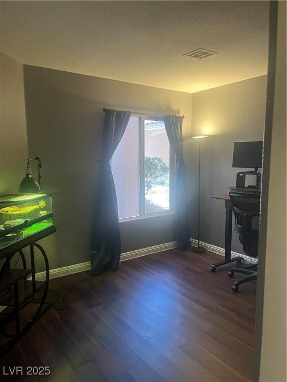 9365 Sparkling Waters Ave, Las Vegas, NV 89129 - home office with baseboards and wood finished floors
