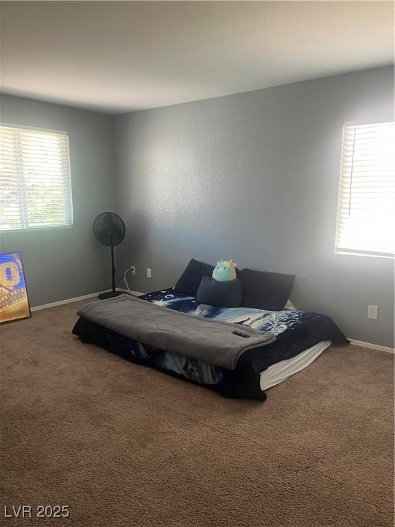9365 Sparkling Waters Ave, Las Vegas, NV 89129 - bedroom with carpet flooring and baseboards