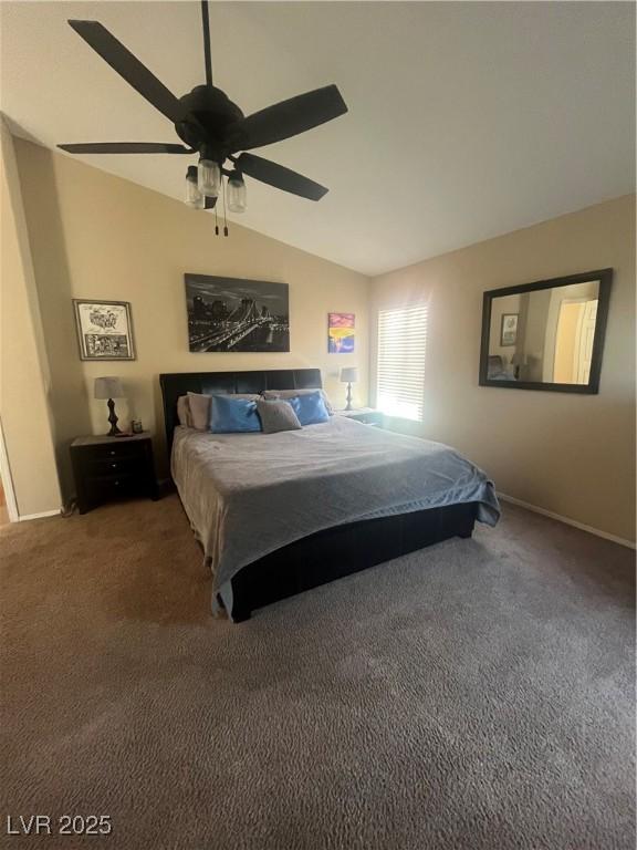 9365 Sparkling Waters Ave, Las Vegas, NV 89129 - carpeted bedroom with lofted ceiling, baseboards, and a ceiling fan