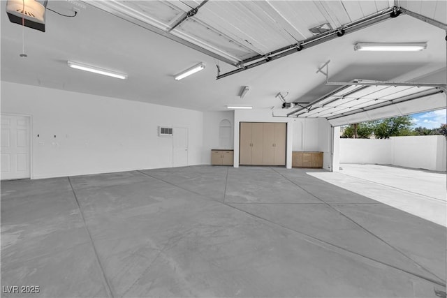 4418 Desert Bloom Ct, Las Vegas, NV 89129 - garage with a garage door opener