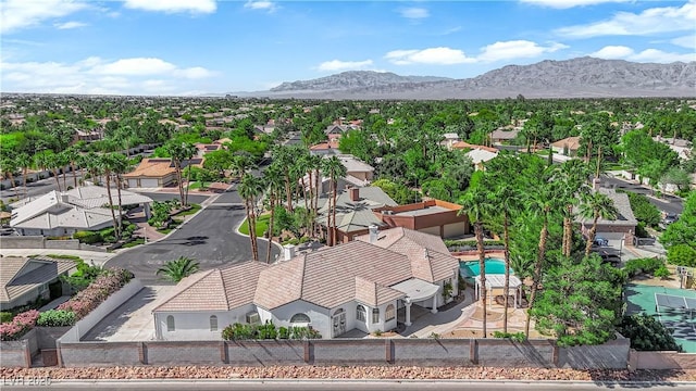 4418 Desert Bloom Ct, Las Vegas, NV 89129 - aerial view of residential area with a mountainous background and a pool