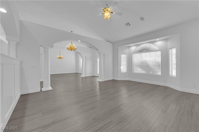 4418 Desert Bloom Ct, Las Vegas, NV 89129 - unfurnished living room with ornate columns, ceiling fan, vaulted ceiling, a chandelier, and wood finished floors