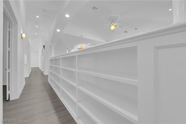 4418 Desert Bloom Ct, Las Vegas, NV 89129 - hallway featuring recessed lighting, wood finished floors, baseboards, and vaulted ceiling