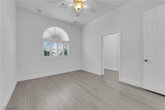 4418 Desert Bloom Ct, Las Vegas, NV 89129 - unfurnished room with wood finished floors, a ceiling fan, and baseboards