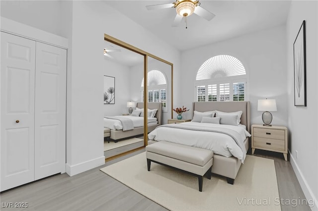 4418 Desert Bloom Ct, Las Vegas, NV 89129 - bedroom featuring light wood-type flooring, baseboards, and a ceiling fan