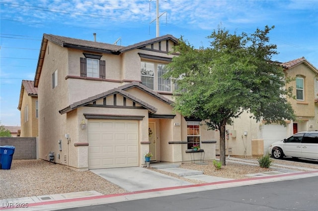 622 Quaint Acres Ave, Las Vegas, NV 89183 - view of front facade featuring stucco siding, driveway, an attached garage, and a tiled roof