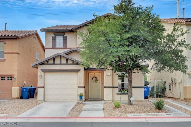 622 Quaint Acres Ave, Las Vegas, NV 89183 - view of front of home featuring stucco siding, concrete driveway, and a garage