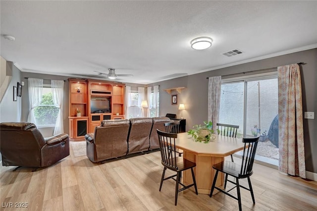 622 Quaint Acres Ave, Las Vegas, NV 89183 - dining area with ornamental molding, light wood-style floors, and ceiling fan