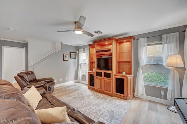 622 Quaint Acres Ave, Las Vegas, NV 89183 - living area with light wood-style floors, plenty of natural light, ornamental molding, and baseboards