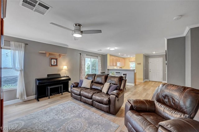 622 Quaint Acres Ave, Las Vegas, NV 89183 - living area with ornamental molding, ceiling fan, light wood finished floors, baseboards, and recessed lighting