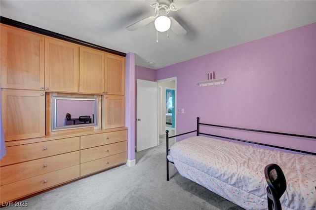 622 Quaint Acres Ave, Las Vegas, NV 89183 - bedroom featuring light carpet, a ceiling fan, and a baseboard heating unit