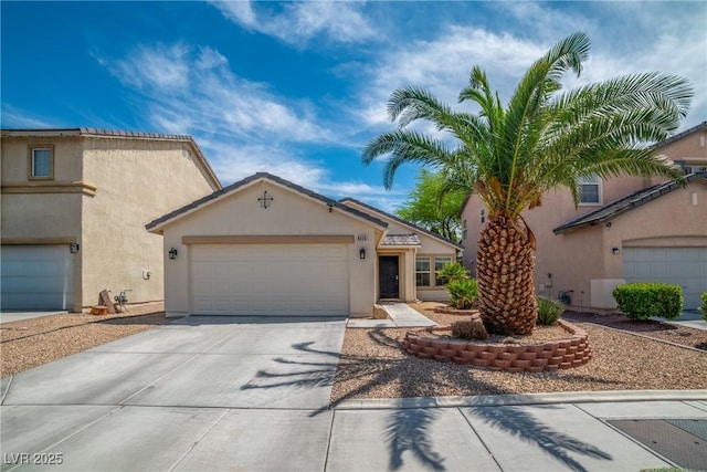 8320 Highland Ranch St, Las Vegas, NV 89131 - view of front facade featuring driveway, stucco siding, and a garage