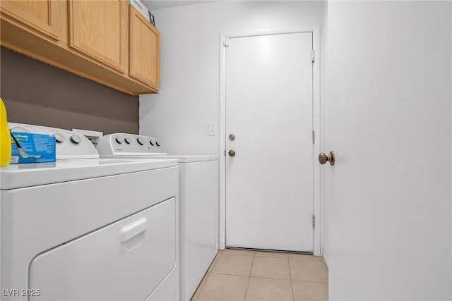 8320 Highland Ranch St, Las Vegas, NV 89131 - laundry area featuring washing machine and dryer, cabinet space, and light tile patterned floors