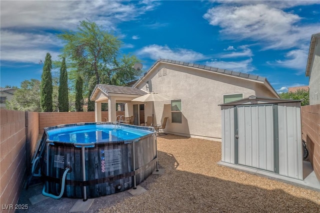 8320 Highland Ranch St, Las Vegas, NV 89131 - back of house with stucco siding and a fenced backyard