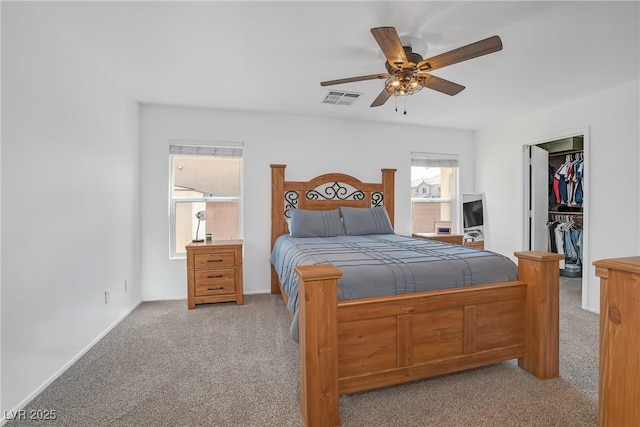 8320 Highland Ranch St, Las Vegas, NV 89131 - bedroom with carpet floors, a walk in closet, ceiling fan, a closet, and baseboards