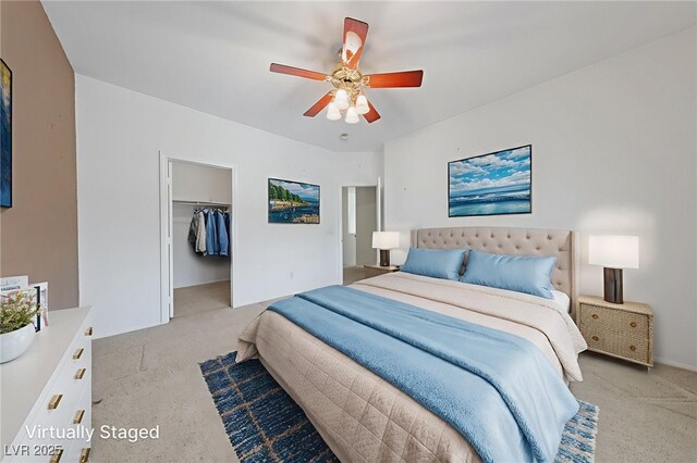 4883 Grey Mesa St, Las Vegas, NV 89149 - carpeted bedroom featuring a walk in closet, a ceiling fan, and a closet