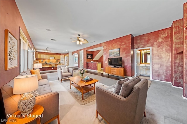 4883 Grey Mesa St, Las Vegas, NV 89149 - living area featuring a ceiling fan, carpet floors, and baseboards