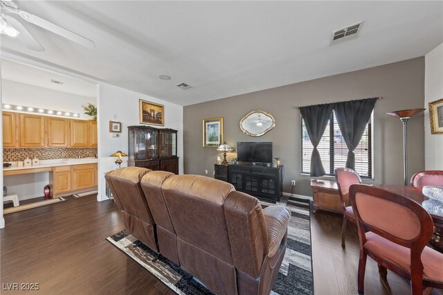 4883 Grey Mesa St, Las Vegas, NV 89149 - living area featuring dark wood-style floors and ceiling fan