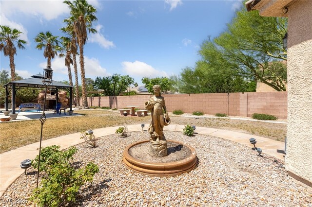 4883 Grey Mesa St, Las Vegas, NV 89149 - fenced backyard with a gazebo and a patio