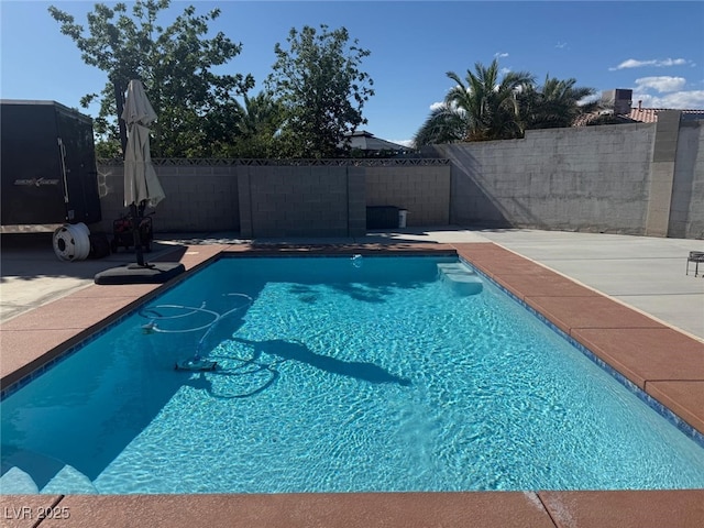 6248 Sapporo Cir, Las Vegas, NV 89110 - view of swimming pool featuring a fenced backyard and a patio area