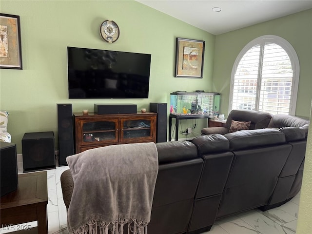 6248 Sapporo Cir, Las Vegas, NV 89110 - living room featuring light marble finish flooring and lofted ceiling