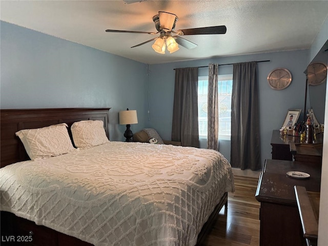 6248 Sapporo Cir, Las Vegas, NV 89110 - bedroom with dark wood finished floors and ceiling fan